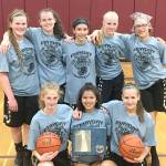 The Next Door Gastropub&rsquo;s Olympic Avalanche Black won four games at the Port Angeles Parks and Recreation&rsquo;s MayDay Roundball Tournament this weekend, taking the trophy in the high school division. From left, rear, are Myra Walker, Jaida Wood, Layla Greene, Maggie Ruddell and M.J. Cooke. From left, front are Emilia Long, Camille Stensgard and Hannah Reetz.