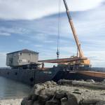 Power outages are expected across Port Townsend today and some streets might be closed as an apartment building is moved from a barge at the waterfront. (Cydney McFarland/Peninsual Daily News)
