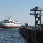 The ferry MV Coho sails past Port Angeles City Pier in February. The ferry will go to a three-round-trips schedule between Port Angeles and Victoria on Thursday. (Keith Thorpe/Peninsula Daily News)