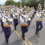 The Sequim High School Marching Band makes its way down the parade route during last year&rsquo;s Irrigation Festival Grand Parade. (Keith Thorpe/Peninsula Daily News)