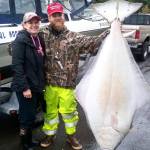 Port Angeles&rsquo; Bobby Harrison and Leanne Price caught this 155-pound halibut in 80 feet of water on the third day of halibut fishing last Thursday.