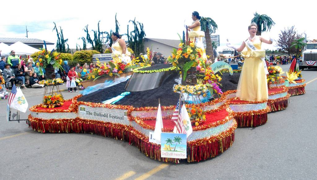 The Grand Sweepstakes Award-winning float representing the Pierce County Daffodil Festival takes part in the Irrigation Festival Grand Parade. (Keith Thorpe/Peninsula Daily News)