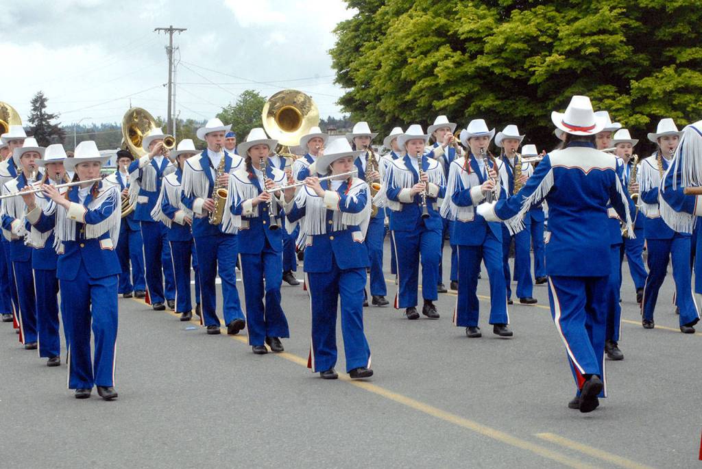 The Chimacum High School Marching Band makes its way down the parade route on Saturday in Sequim. (Keith Thorpe/Peninsula Daily News)