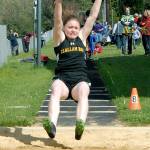 Keith Thorpe/Peninsula Daily News                                Hannah Olson of Clallam Bay competes in the long jump during the North Olympic League Sub District Meet at Crescent High School in Joyce.