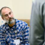 Dr. Robert Epstein talks to a patient who is in North Olympic Healthcare Network&rsquo;s medication-assisted treatment program Monday. NOHN recently was approved for $250,000 in funding to expand its program from about 120 patients to about 300 patients. (Jesse Major/Peninsula Daily News)