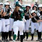 DISTRICT SOFTBALL: Rider girls muscle up