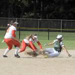 Lonnie Archibald/for Peninsula Daily News Port Angeles&rsquo; Cheyenne Wheeler slides safely into second base against Steilacoom in the Roughriders&rsquo; 10-0 win Friday at the West Central District 3 softball tournament in Spanaway.