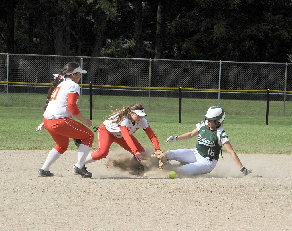Lonnie Archibald/for Peninsula Daily News Port Angeles&rsquo; Cheyenne Wheeler slides safely into second base against Steilacoom in the Roughriders&rsquo; 10-0 win Friday at the West Central District 3 softball tournament in Spanaway.