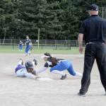 DISTRICT SOFTBALL: Rider girls muscle up