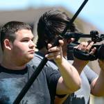 Sophomores Bradley Shumway, left, and Jordan Campbell film during their cinema and TV production class at the North Olympic Peninsula Skills Center on Wednesday. (Jesse Major/Peninsula Daily News)