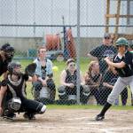 Steve Mullensky/for Peninsula Daily News                                Quilcene catcher Erin Macedo focuses on the ball as Muckleshoot&rsquo;s Anez Rincon takes a pitch during a softball game earlier this season.                                Steve Mullensky/for Peninsula Daily News Quilcene catcher Erin Macedo focuses on the ball as Muckleshoot&rsquo;s Anez Rincon takes a pitch during a softball game earlier this season.