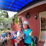 Jefferson Community School student Jocelyn poses for a photo with some kids in Cuba. (Jefferson Community School)