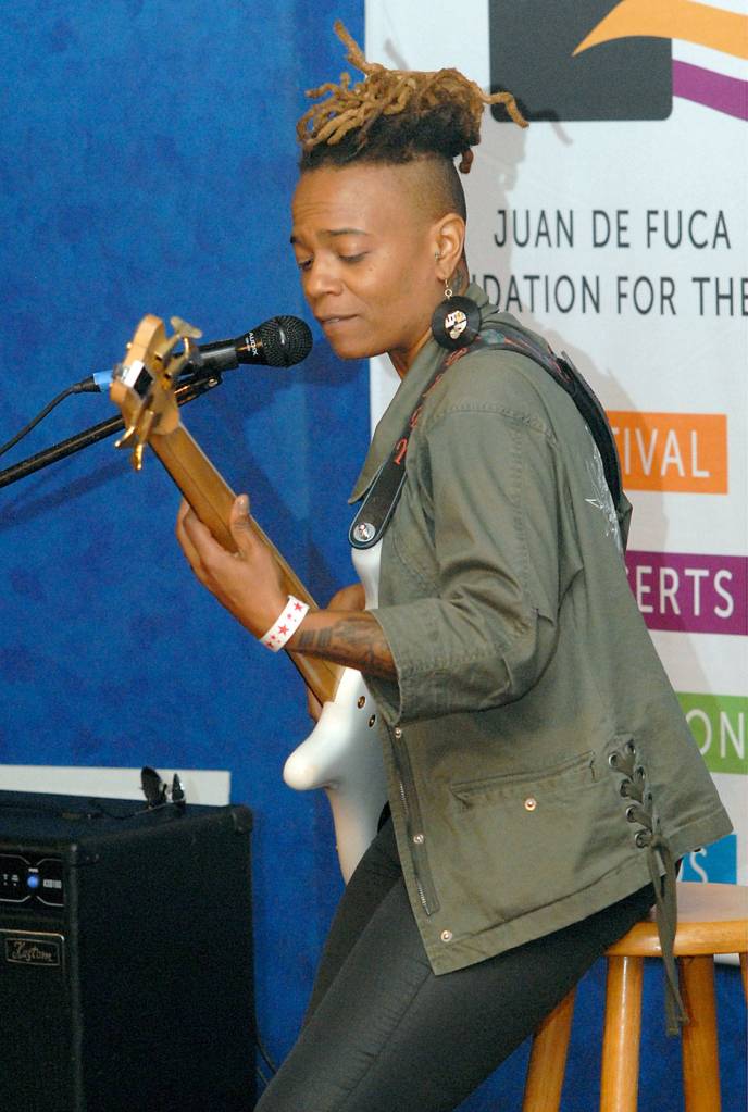Bassist Divinity Roxx lays down a set of licks during a performers workshop Saturday on the Chamber Stage in Port Angeles City Hall. (Keith Thorpe/Peninsula Daily News)
