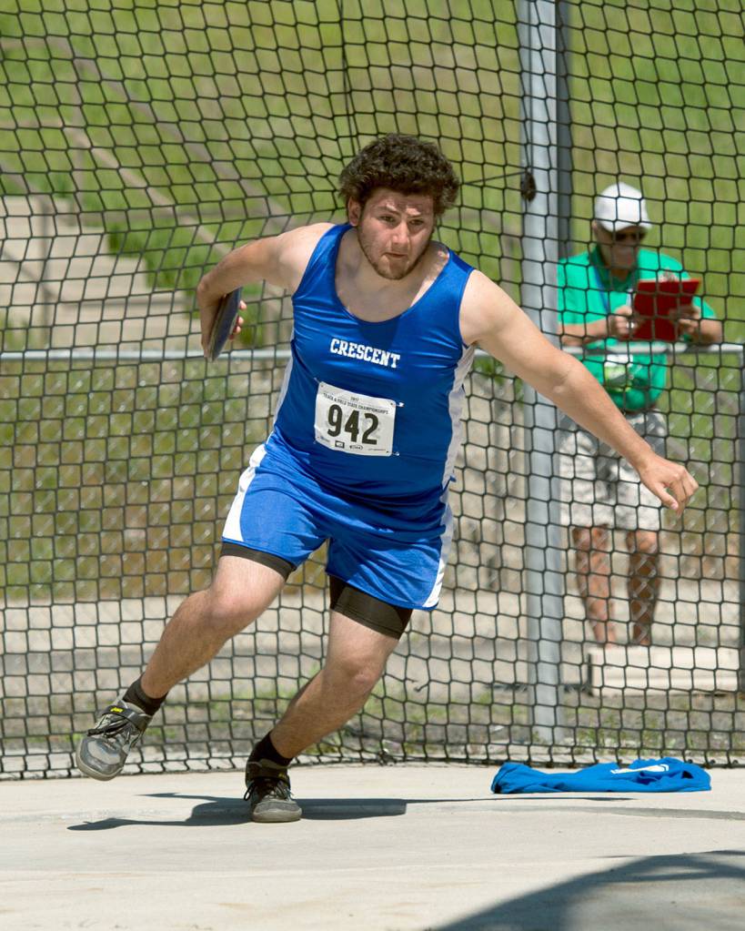 Casey Bruner/for Peninsula Daily News Wyatt McNeese of Crescent placed fourth Friday in the discus at the State 1B Track and Field Championships in Cheney.