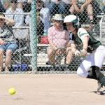 Lonnie Archibald/for Peninsula Daily News Port Angeles&rsquo; Sierra Robinson lays down a bunt for a base hit in the 2A state semifinals against Selah Saturday.