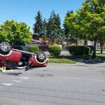 A Ford Explorer ended up on its roof following a two-vehicle rollover wreck Sunday at Second and Vine streets in Port Angeles. (Port Angeles Police Department)