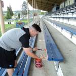 Pierre LaBossiere/Peninsula Daily News                                Lefties first baseman Joey Galeno was one of several players working hard on sprucing up Civic Field this week in preparation for the Lefties&rsquo; opener today. Here, Galeno, from Pacific University in Forest Grove, Ore., is painting bleachers, while other players were painting the locker room in Lefties&rsquo; orange and blue.
