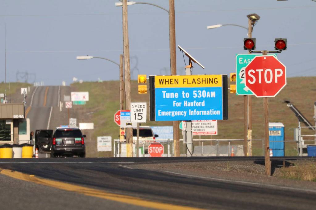 An emergency sign flashes by the Hanford Nuclear Reservation on Tuesday in Richland. (Manuel Valdes/The Associated Press)