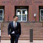 Hawaii Attorney General Doug Chin arrives to talk to reporters Monday outside a federal courthouse in Seattle. (Ted S. Warren/The Associated Press)