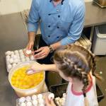 Ross McCurdy, owner of the Oak Table Cafe in Silverdale, currently holds the Guinness World Record for most eggs cracked one-handed in a minute. He, along with his daughter, Mira, 12, have been invited by celebrity chef Gordon Ramsay to test that record on a special Father&rsquo;s Day episode of Ramsay&rsquo;s show &ldquo;The F Word.&rdquo; (Larry Steagall/Kitsap Sun via AP)