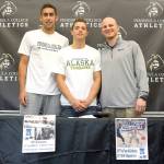 Peninsula College Athletics                                Peninsula College men&rsquo;s basketball players, from left, Alex Baham and Jalon McCullough are pictured with Pirates head coach Mitch Freeman after signing letters of intent to continue their college careers with the University of Alaska-Fairbanks. Baham is from Wasilla, Alaska and McCullough is from Fairbanks.
