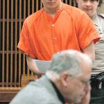 Benjamin Bonner approaches defense attorney Harry Gasnick during Bonner&rsquo;s first appearance in Clallam County Superior Court earlier this month on charges of second-degree murder, animal curelty and theft of a motor vehicle. (Keith Thorpe/Peninsula Daily News)