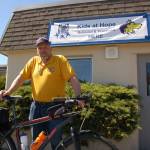 Dave Toman, a Sequim School District security guard and member of the Sequim Bicycle Alliance, rides his bike to work every day. He is part of an initiative to encourage bicyclists to ride throughout the month of May and beyond. (Erin Hawkins/Olympic Peninsula News Group)