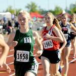 Michael Dashiell/Olympic Peninsula News Group Port Angeles&rsquo; Gracie Long (No. 1658) finished seventh in the girls&rsquo; 1,600-meter run Friday at the State 2A Track and Field Championships at Mount Tahoma High School. Long&rsquo;s time of 5:08.58 broke a 33-year-old Port Angles High School record.