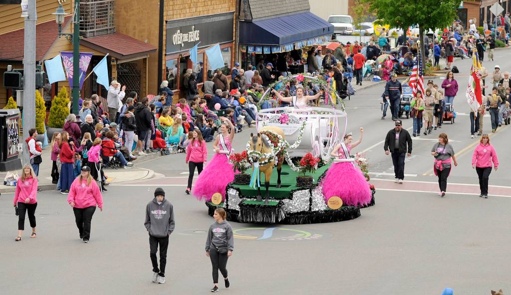Port Townsend&rsquo;s Rhody Festival Queen Lauren Montgomery and company get big cheers from the Sequim crowd at Saturday&rsquo;s Grand Parade. (Michael Dashiell/Olympic Peninsula News Group)