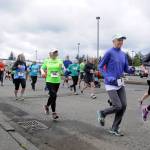 More than 70 participants break from the starting line at Saturday&rsquo;s Sequim Irrigation Festival Fun Run 5K. (Matthew Nash/Olympic Peninsula News Group)