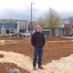 Ken Stringer, head organizer of Whimsy Park, stands on an intersecting walkway at the new temporary park in Sequim. (Erin Hawkins/Olympic Peninsula News Group)