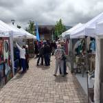 Visitors check out booths at the Innovative Arts and Crafts Fair during a past Sequim Irrigation Festival.