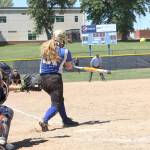 Lori Carthum/for Peninsula Daily News                                Chimacum&rsquo;s Shanya Nisbet belts a two-run double during the Class 1A State Softball Tournament last weekend. Nisbet was voted Co-MVP of the Olympic League 1A Division by league coaches.