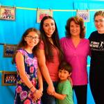 Mary Marcial, second from right, pauses at the Port Angeles Dance Center with, from left, her granddaughter, Amara Gonzalez, 10; daughter Catalina Gonzalez; grandson Tomás Gonzalez, 4; and soloist Elizabeth Helwick. (Diane Urbani de la Paz/for Peninsula Daily News)