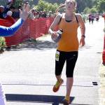 Women&rsquo;s marathon winner Jenine Adam of Bainbridge Island nears the finish line in Port Angeles. (Dave Logan/for Peninsula Daily News)