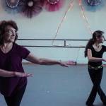 Port Angeles Dance Center founder Mary Marcia, center, leads students, left, Grace Kathol and Amara Gonzalez.