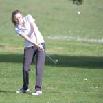 Sequim&rsquo;s Alex McMenamin chips for the green during a match at Port Townsend Golf Course. McMenamin is the All-Peninsula Girls MVP for the fourth consecutive season.                                Steve Mullensky/for Peninsula Daily News
