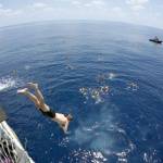 Crew members of the Coast Guard cutter Active dive off and swim in the Eastern Pacific Ocean off the coast of Costa Rica in May. (Lt. Cmdr. Jennifer Runion/U.S. Coast Guard)