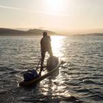 Karl Kruger, the sole member of Team Heart of Gold, paddles into the sunset on Day 3 of the Race to Alaska. Kruger, along with most of the other paddlers, camped at Campbell Creek to wait out an evening storm that rolled in Wednesday night, on Day 4 of the race. (Liv von Oelreich/R2AK)