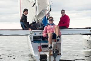 Brothers Tripp, Chris and Trevor Burd of Team Pure & Wild/Freeburd were the first to cross the finish line in Ketchikan after 750 miles of sailing and peddling. Credits: (Daphne Stuart/R2AK)