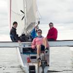 Brothers Tripp, Chris and Trevor Burd of Team Pure & Wild/Freeburd were the first to cross the finish line in Ketchikan after 750 miles of sailing and peddling. (Daphne Stuart/R2AK)