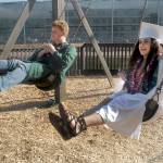 Port Angeles High School seniors Gabe Wegener, left, and Mia DelGuzzi-Flores enjoy time on the swingset at the Dream Playground at Erickson Playfield prior to Friday night&rsquo;s commencement ceremony at nearby Civic Field. A total of 237 students were scheduled to graduate as part of the high school&rsquo;s class of 2017. (Keith Thorpe/Peninsula Daily News)