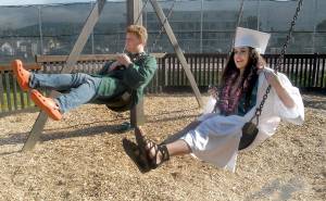 Port Angeles High School seniors Gabe Wegener, left, and Mia DelGuzzi-Flores enjoy time on the swingset at the Dream Playground at Erickson Playfield prior to Friday night&rsquo;s commencement ceremony at nearby Civic Field. A total of 237 students were scheduled to graduate as part of the high school&rsquo;s class of 2017. (Keith Thorpe/Peninsula Daily News)
