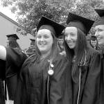 Nursing students, from left, Carrie Bertman of Port Angeles, Michelle Abell-Sietz of Sequim and Jessica Meek of Port Angeles pose for a group selfie while lining up for commencement ceremonies on Saturday on the Port Angeles campus of Peninsula College. A total of 275 students were set to take part in the proceedings out of 486 students receiving 600 degrees and certificates.