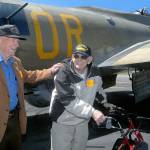 Veterans Frank Meek of the U.S. Navy and Don Alward of the U.S. Marine Corps show delight at the end of their flight aboard a restored B-17 bomber on Wednesday at William R. Fairchild International Airport in Port Angeles. (Keith Thorpe/Peninsula Daily News)