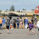 A World War II-era B-17 bomber takes off as a crowd watches at William R. Fairchild International Airport in Port Angeles on Wednesday during a stop on the Wings of Freedom Tour of vintage war planes. (Keith Thorpe/Peninsula Daily News)