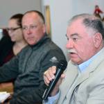Jim Moran, right, candidate for Port Angeles City Council Position 1, answers a question during the Port Angeles Business Association candidate forum Tuesday. Marolee Smith, left, and Todd Negus also participated in the forum. (Jesse Major/Peninsula Daily News) ​