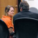 Deanna Wilson, left, confers with attorney John Black during Wilson&rsquo;s sentence hearing Wednesday in Clallam County Superior Court in Port Angeles. (Keith Thorpe/Peninsula Daily News)