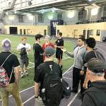 Port Townsend Football Port Townsend football players listen to Justin Glenn, director of high school relations for the University of Washington football program, describe features of the Dempsey Indoor Practice Facility during a recent tour.
