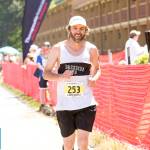 North Olympic Discovery Marathon                                Port Angeles&rsquo; Tom St. Amand nears the finish line of the North Olympic Discovery Marathon in 2015. St. Amand has finished all 14 marathons and will run in the 15th annual event Sunday.
